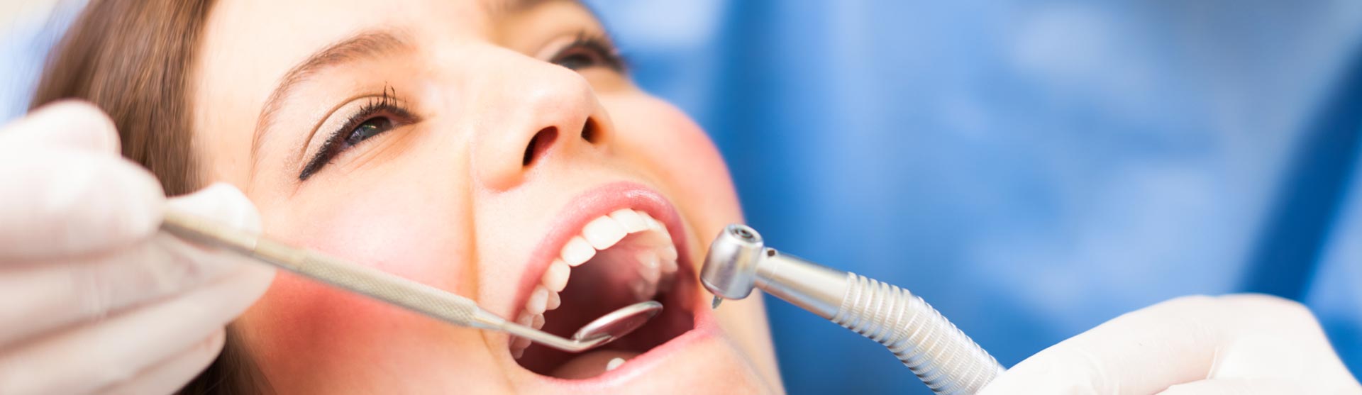 Dentist doing composite fillings treatment